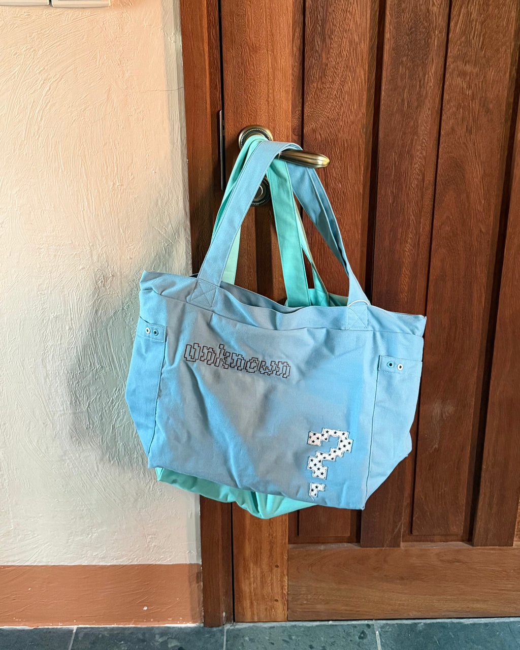 "Unknown" Tote Bag 2026